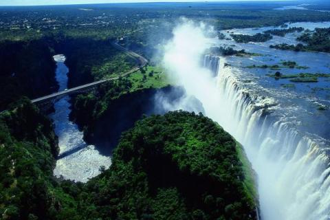 victoria-falls-with-the-famous-bridge-that-forms-the-border-post-between-zambia-and-zimbabwe